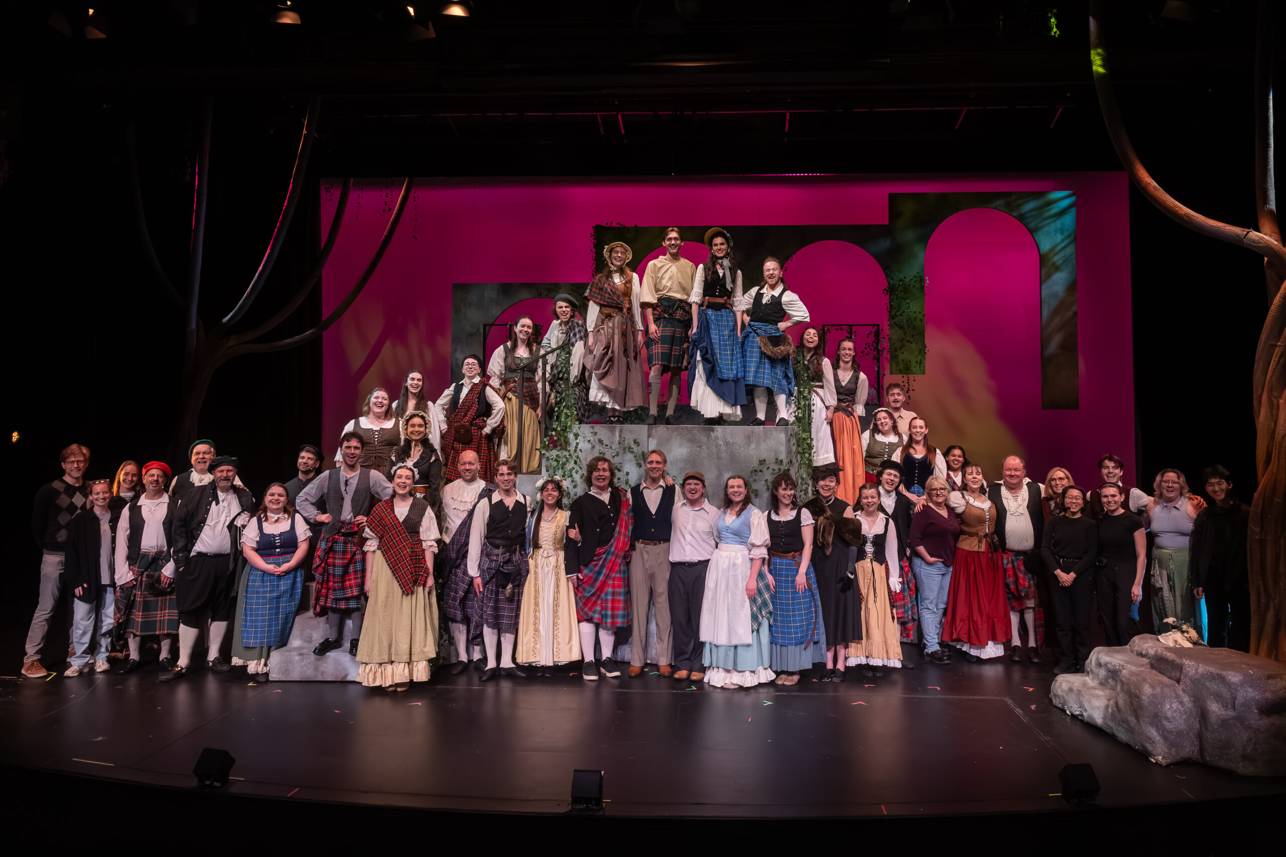 NUOVA Vocal Arts cast and creative team gathered onstage after a performance of Brigadoon.